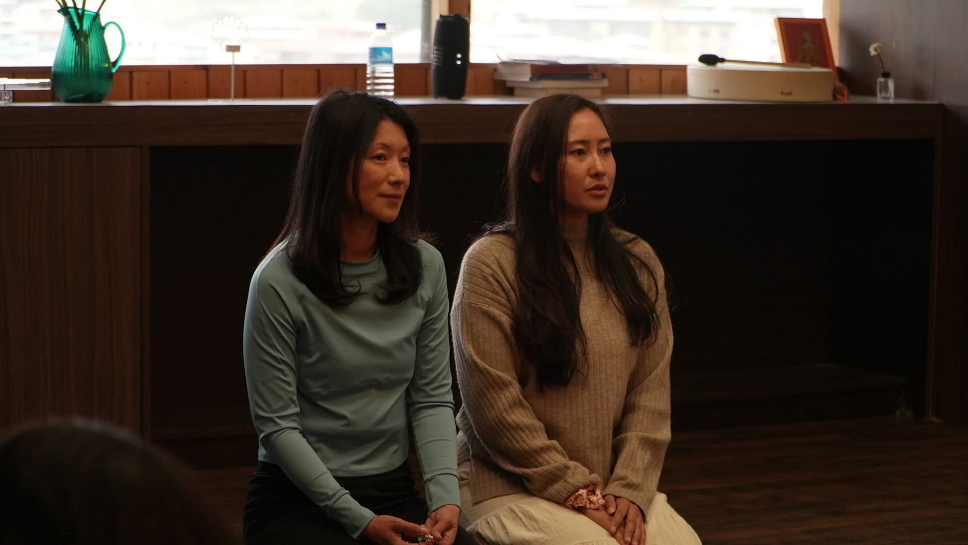 Tshering and Jigme holding a session together